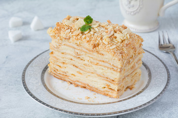 Napoleon cake, russian cuisine layered cake with pastry cream. Close up view