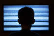© soupstock - Boy watching television with noise