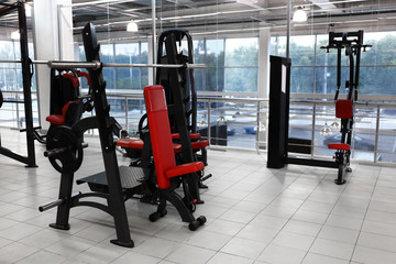 Wall Mural - Weight lifting machines in gym