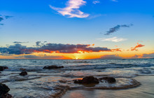 Sun Setting With An Outgoing Tide In Maui, Hawaii