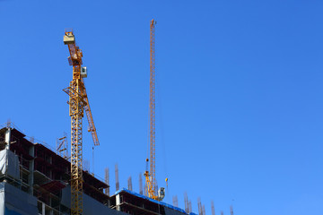 machinery crane in construction site building industry