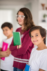 Wall Mural - Happy kids at home with books