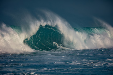 Wall Mural - Huge waves crashing in ocean. Seascape environment background. Water texture with foam and splashes. Hawaiian surfing spots with nobody