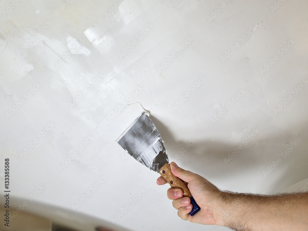 Smoothing A Ceiling With Plaster And A Spatula Foto Poster