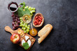 © Evgeny Karandaev - Wine, grape, cheese, sausages