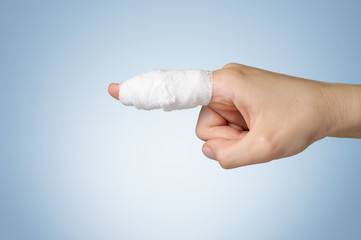 Injured finger with bandage