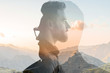 Triple exposure portrait of a businessman combinated with beautiful mountain landscape on the sunset