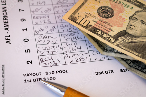 фотография Detail of wager for Superbowl Pool grid with money