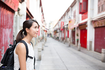 Wall Mural - Young woman in Macao city