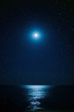 The Full Moon In The Starry Sky ,the Moonlight On The Sea