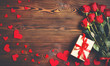 Background Valentine's Day. heart, gift  and roses on wooden.