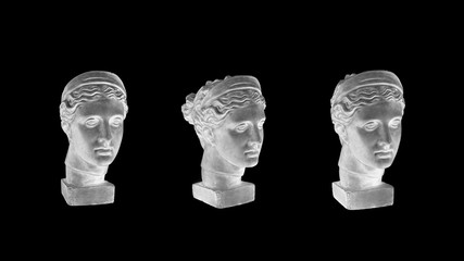 Wall Mural - Marble head of young woman, ancient Greek goddess bust isolated on black background.