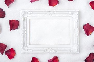 decorations and frame laying on the Snow and Rose petals