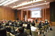 © narin_nonthamand - Blurred image of education people and business people sitting in conference room for profession seminar and the speaker is presenting new technology and idea sharing with the content activity.