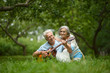 © aletia2011 - Mature couple with guitar   in park