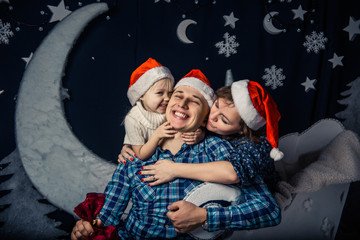 Christmas photo of surprised family happiness smile