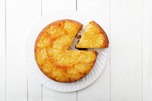 Pineapple Upside Down Cake On White Wooden Table