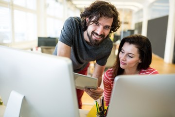 Poster - Graphic designers working over computer
