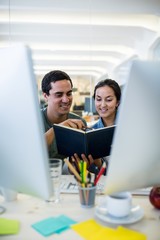 Poster - Graphic designers working at desk