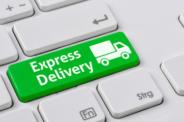 Wall Mural - a keyboard with a green button - express delivery