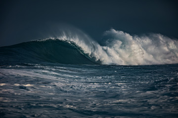 Wall Mural - huge waves crashing in ocean. seascape environment background. water texture with foam and splashes.