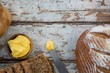 © WavebreakMediaMicro - Bowl of butter with butter knife and variety of breads
