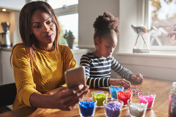 Wall Mural - Mother forgetting child because cell phone