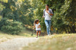 © BalanceFormCreative - Mother and daughter playing and running around the park on beautiful morning.
