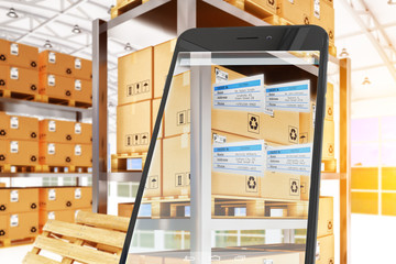 Wall Mural - Industry 4.0, warehouse logistics, packages dispatching and delivery concept, mobile phone with augmented reality showing the orders labels on cardboard boxes at racks in storage