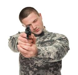 Wall Mural - Soldier with pistol on white background