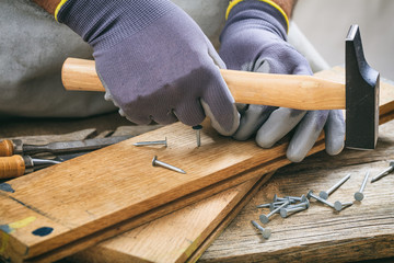 Poster - Man working with a hammer