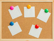 colorful magnet put on white paper on cork board texture or background