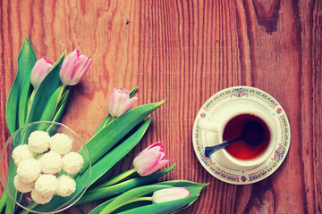 Wall Mural - background wooden with tulip and tea