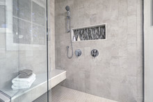Glass Walk-in Shower In A Bathroom Of Brand New Home