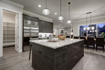 Wall Mural - Modern gray kitchen features dark gray cabinetry