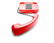 Red landline phone on isolated background with a shadow
