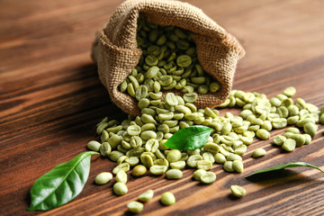 Poster - Coffee grains in sackcloth on table