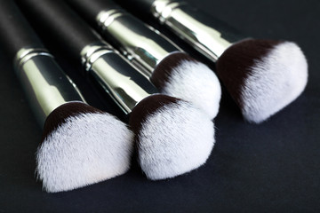 Brush with natural bristles for professional makeup, closeup, co