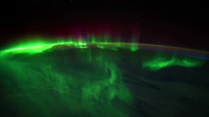 the northern lights, or the aurora borealis, shine brightly in this time-lapse footage taken from th