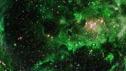 Wall Mural - stars fly past the viewer against a background of green gas and clouds in space.