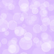Seamless bokeh background pattern.  Purple bokeh wallpaper.