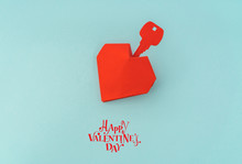 Paper Cut Of Key For Heart As A Symbol Of Love .