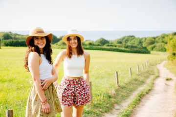 Wall Mural - Beautiful friends enjoying summer and nature