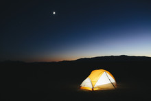 Illuminated Camping Tent In Vast Desert At Dusk, Black Rock Desert, Nevada