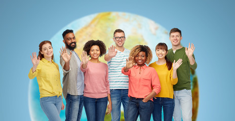 Wall Mural - international group of happy people waving hand