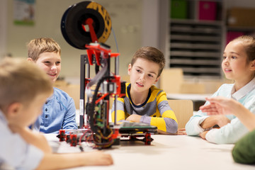 Wall Mural - happy children with 3d printer at robotics school