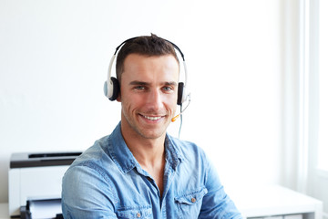 Wall Mural - Portrait of male operator with headset