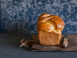 Homemade brioche on a dark background. Front view. Delicious pastries