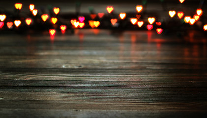 heart bokeh, valentine's day concept on wooden background