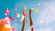 © kieferpix - Hand throwing rose pedals. Party and celebration concept.